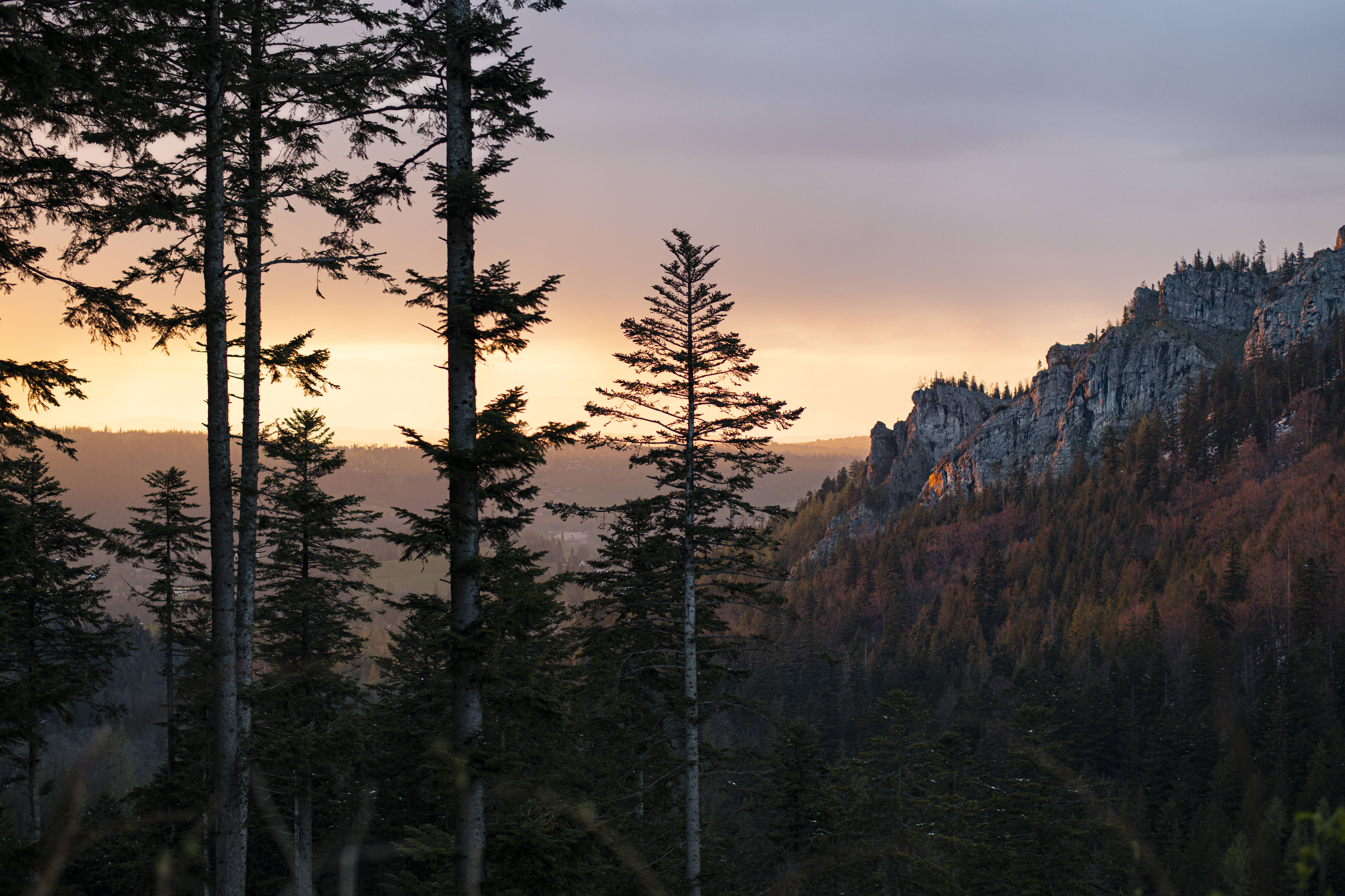 Sunrise over mountain ridgelines with fog